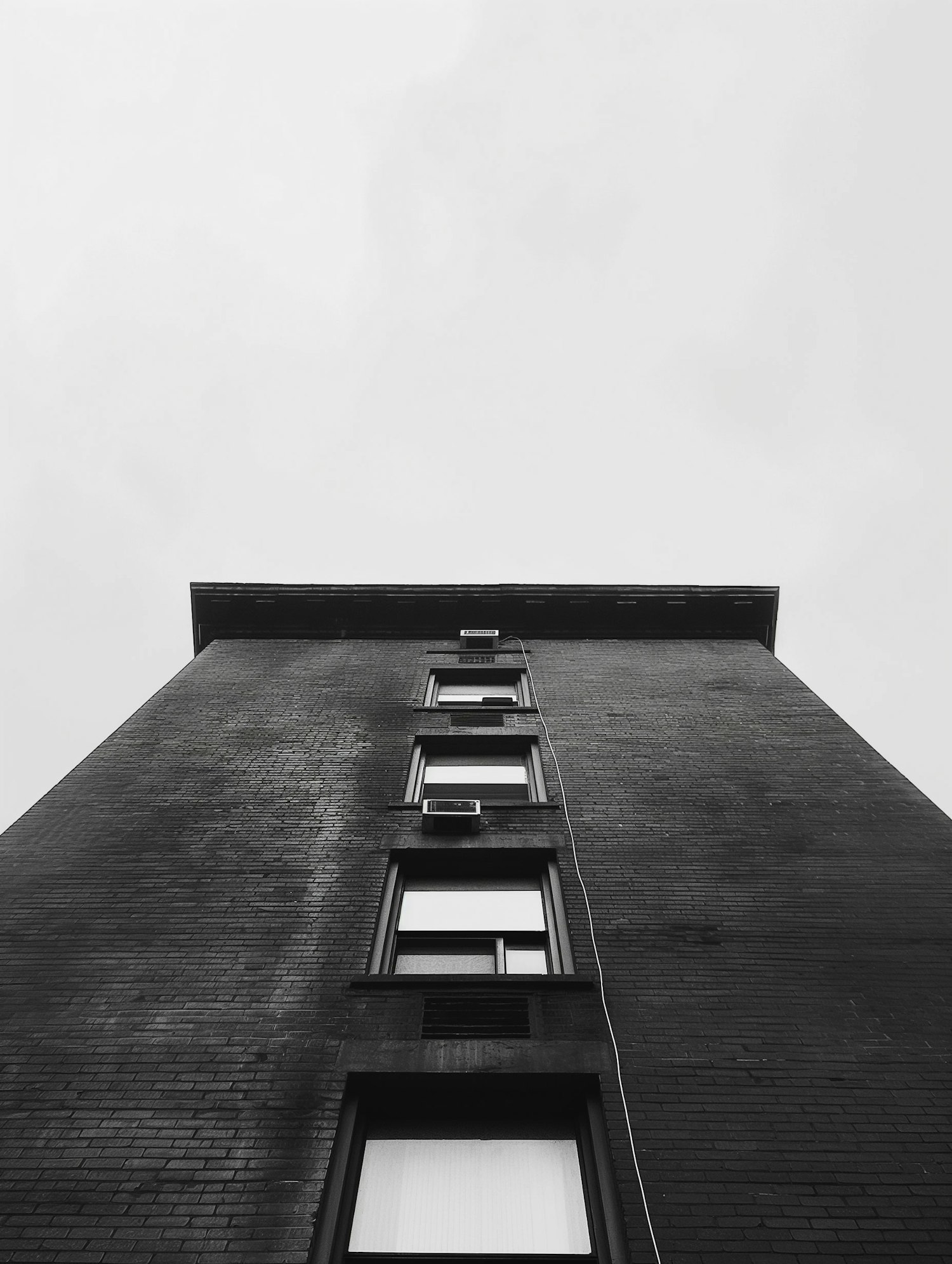 Architectural Perspective Against Overcast Sky