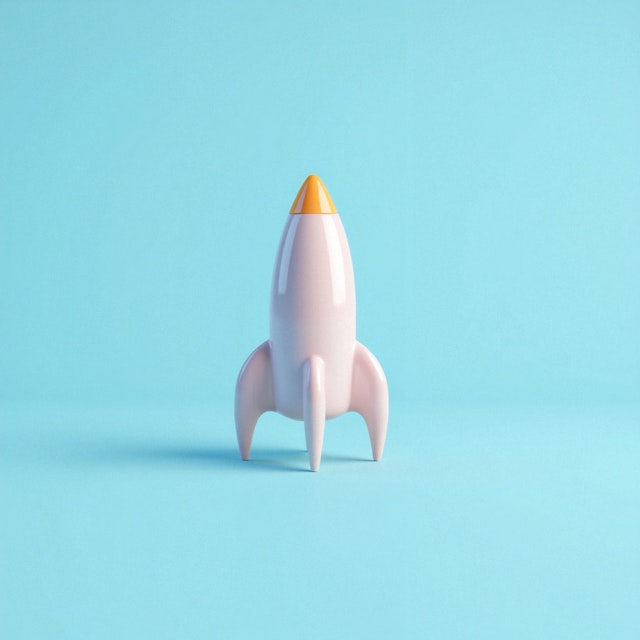 Stylized Rocket on Blue Background