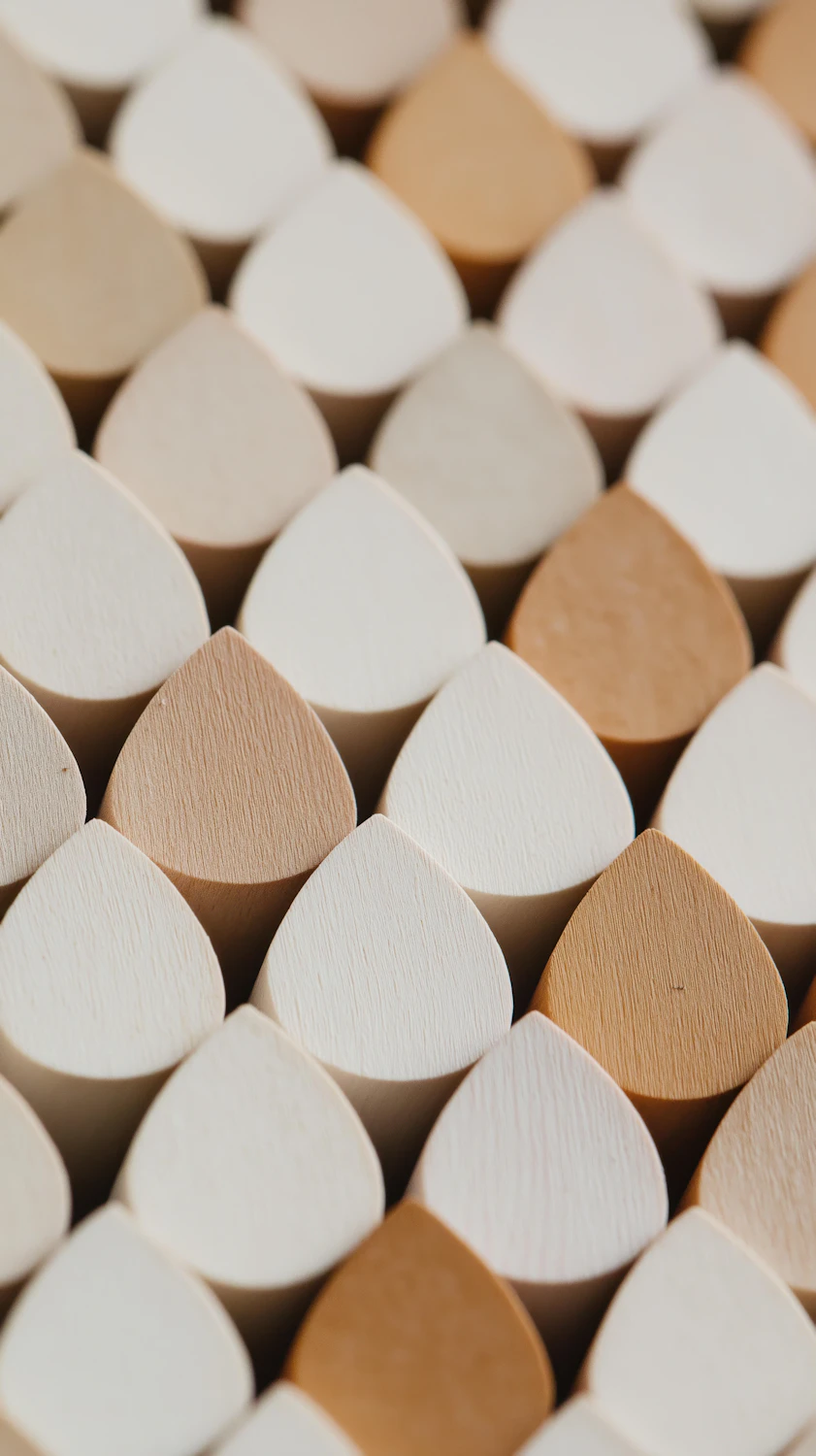 Close-up of interlocking wooden shapes arranged in a tight pattern