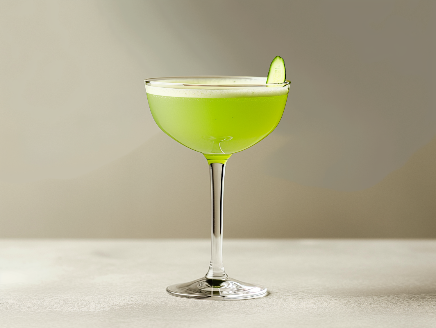 Vibrant Green Cocktail with Cucumber Garnish