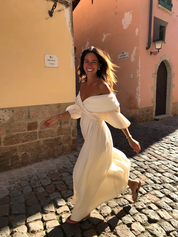 Woman on Cobblestone Street