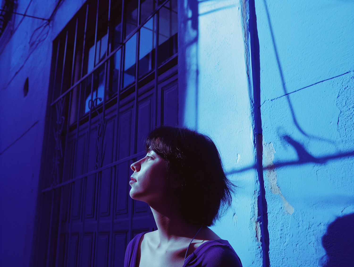 Serenity in Blue: Asian Profile with Purple Top