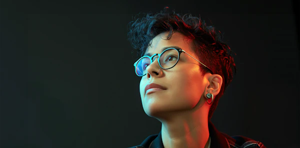 Contemplative Portrait with Dramatic Lighting
