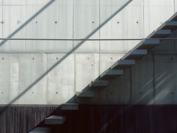 Geometric Staircase and Concrete Wall