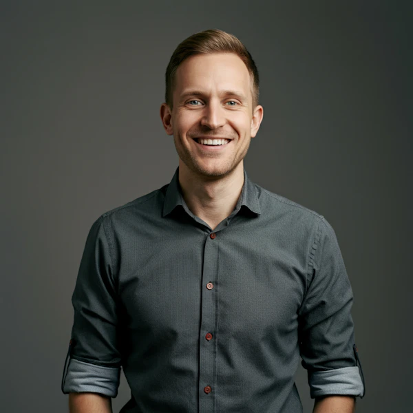 Smiling Man in Green Shirt