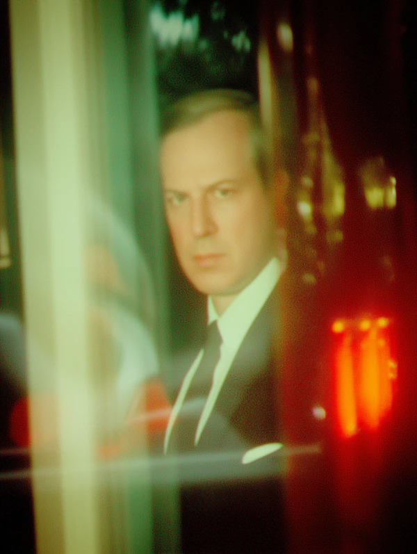 Man Behind Glass