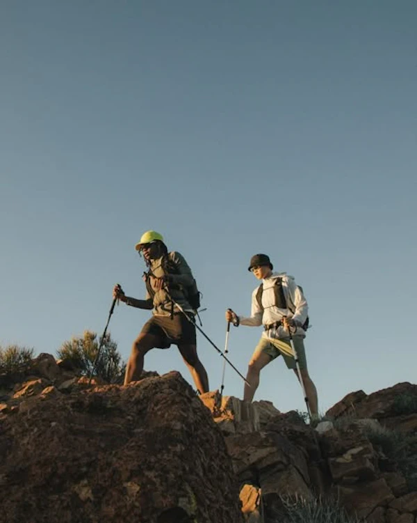 Hikers on Rocky Terrain