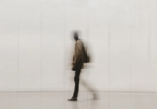 Blurred Walking Figure