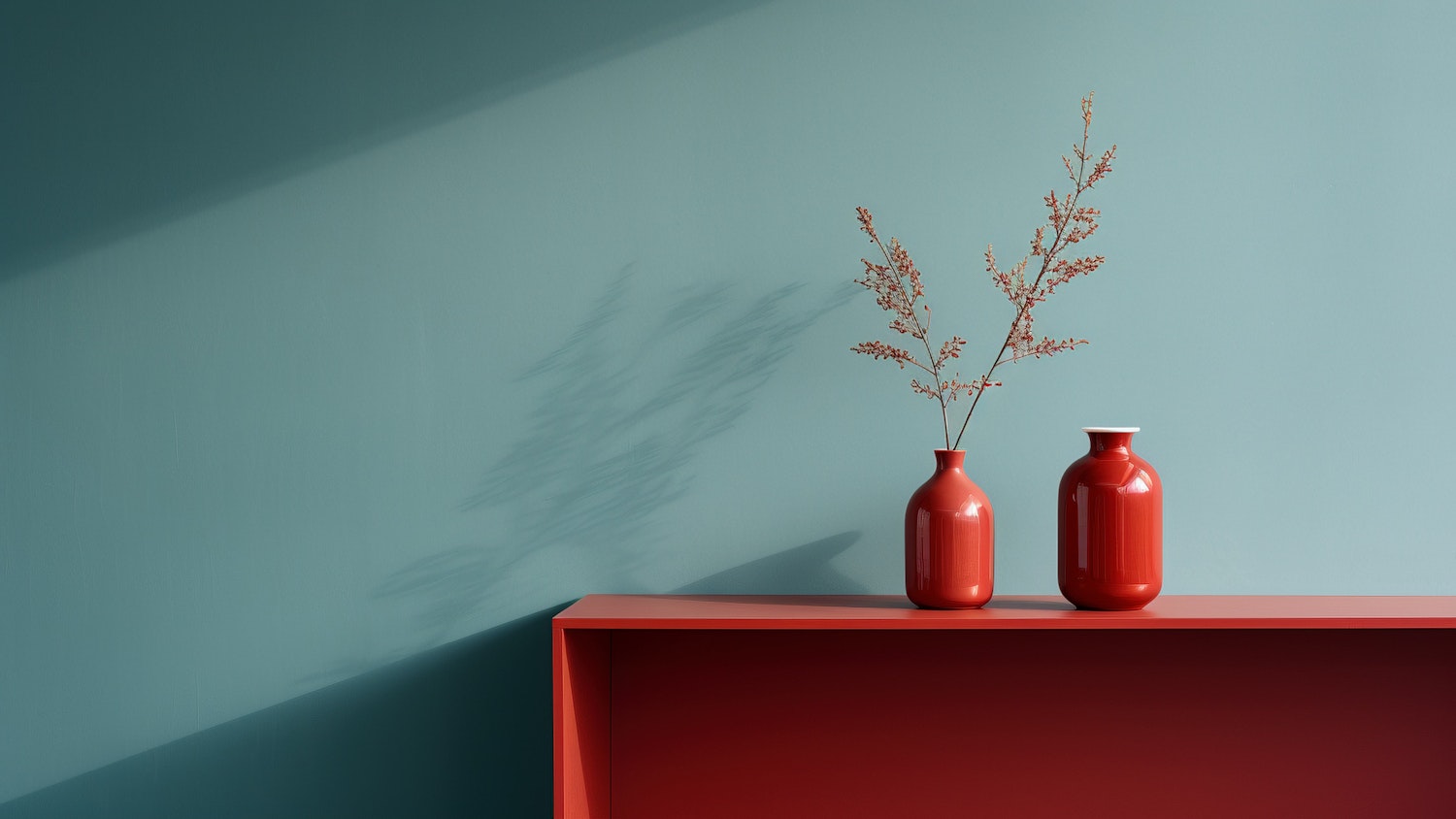 Red Vases with Blossoms on Teal Background