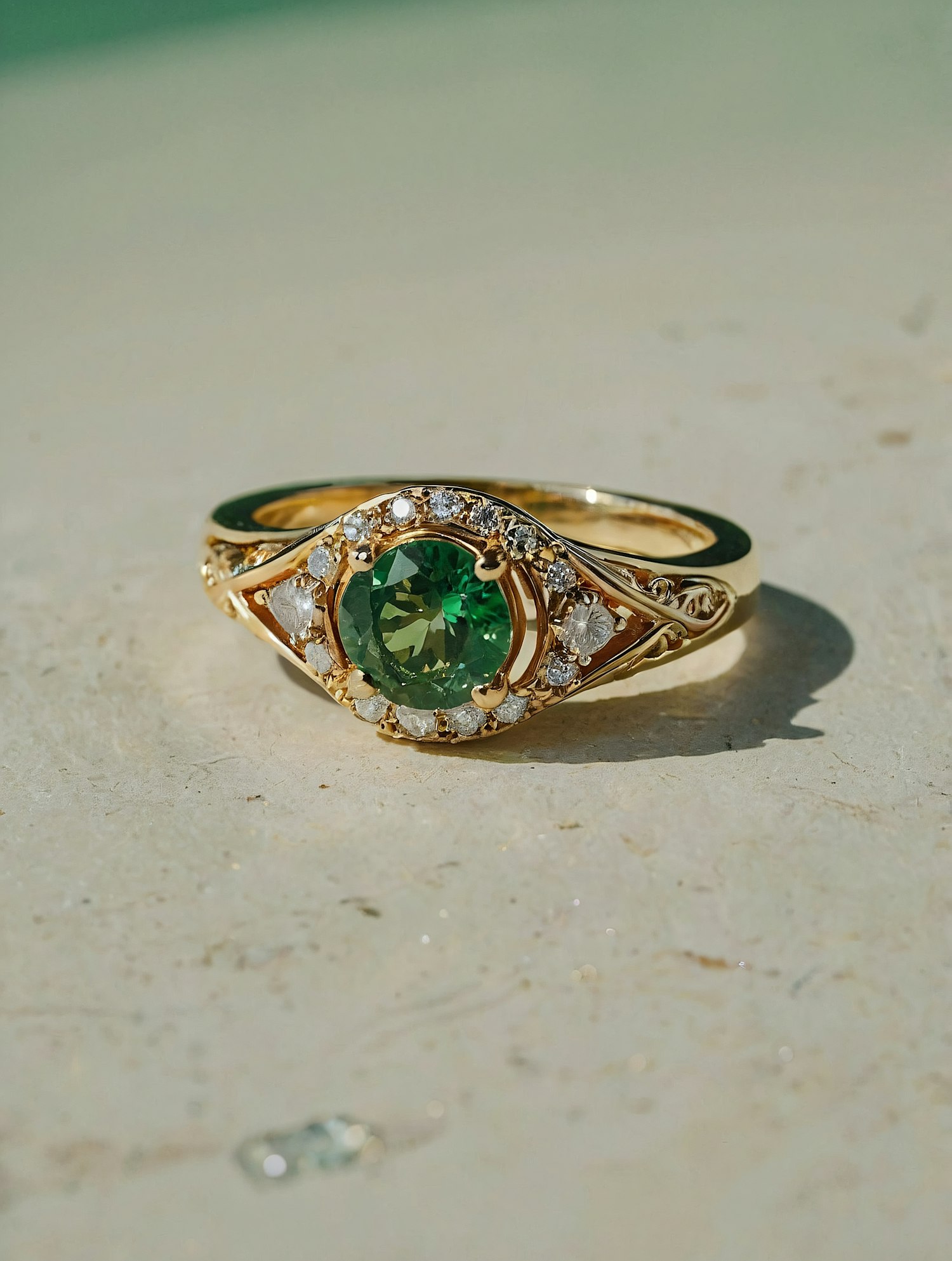 Elegant Gold Ring with Green Gemstone