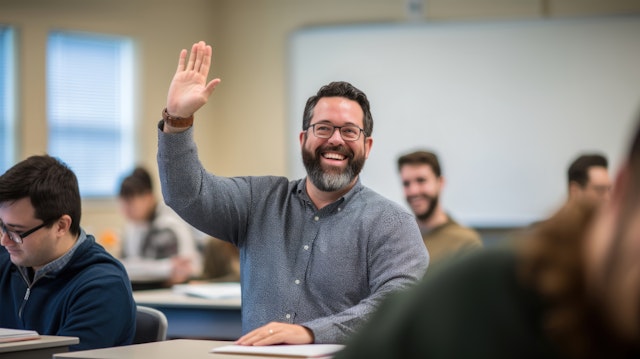 Cheerful Man in a Classroom