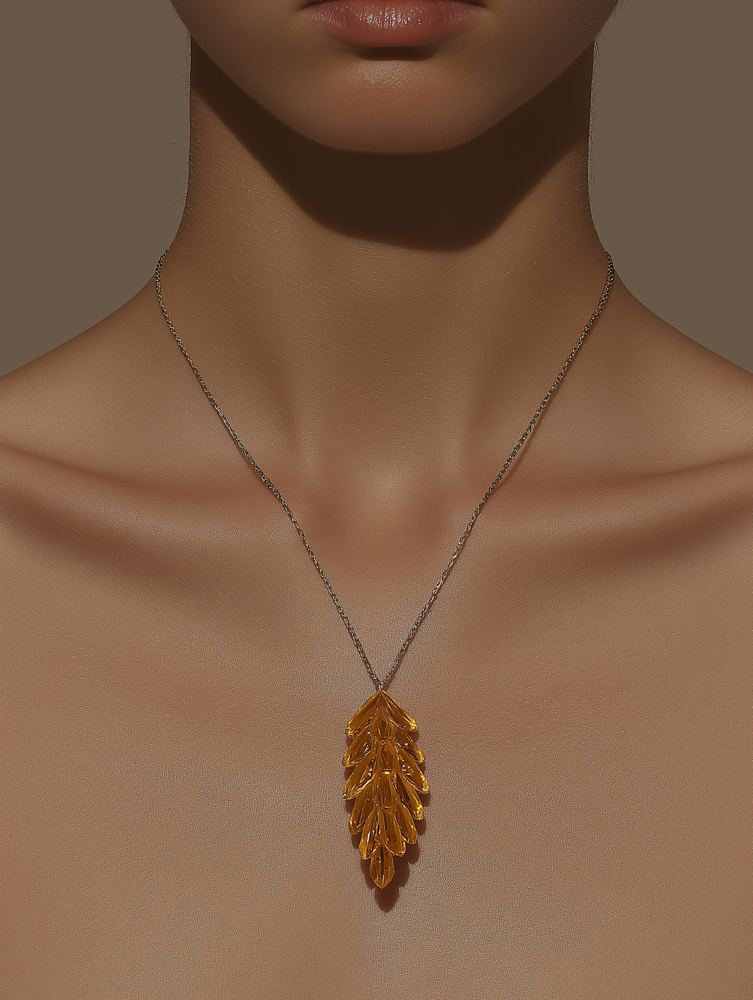 Close-up of Gold Pendant Necklace