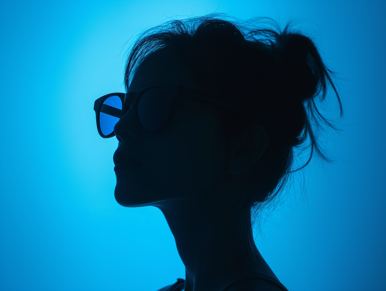 Contemplative Silhouette with Stylish Glasses