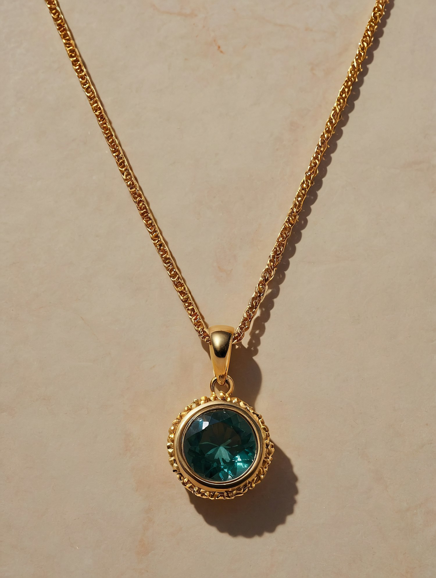 Gold Necklace with Green Gemstone Pendant