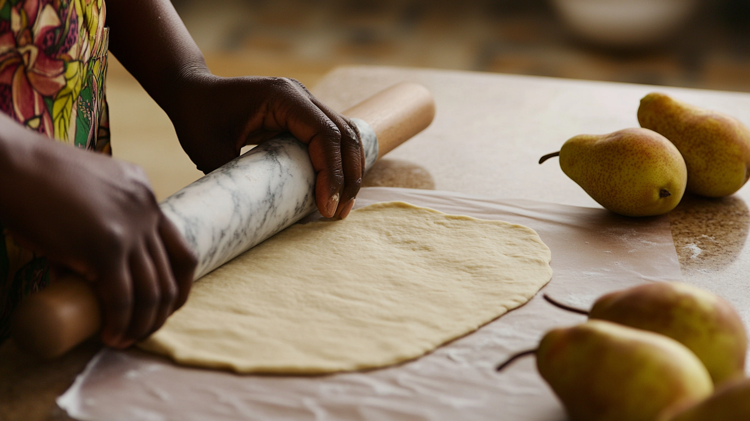 Hands Rolling Dough with Pears