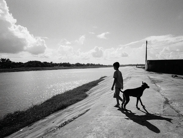 Boy and Dog Riverside Walk