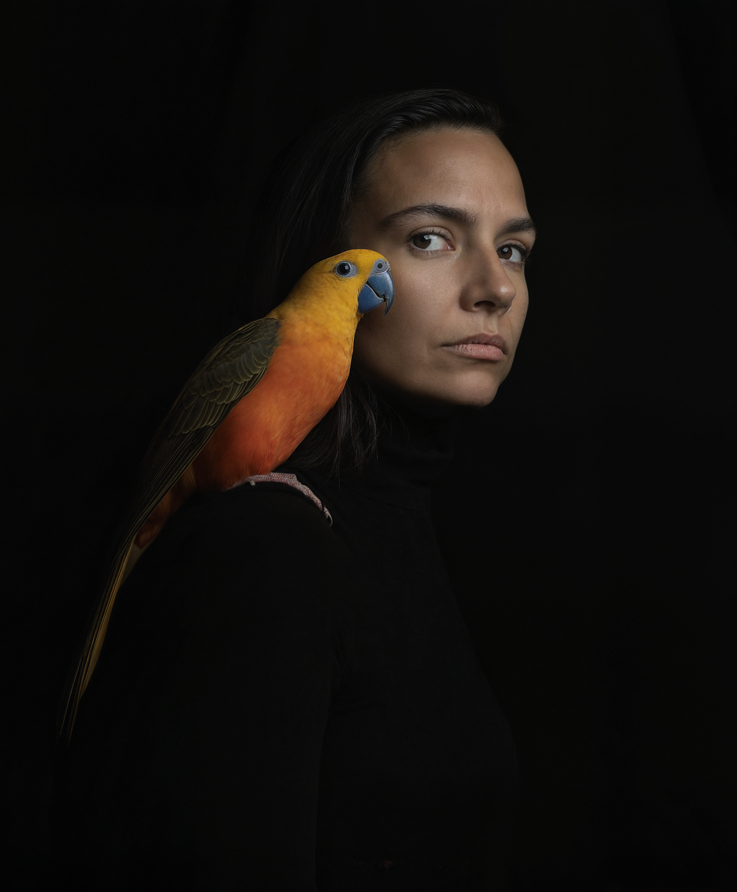 Contemplative Woman with Colorful Parrot