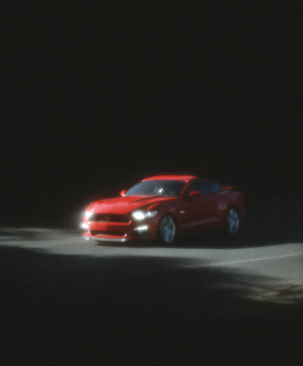 Red Sports Car at Night