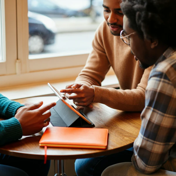 Collaborative Discussion Around Tablet
