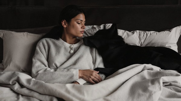 Tranquil Moment Between Woman and Dog