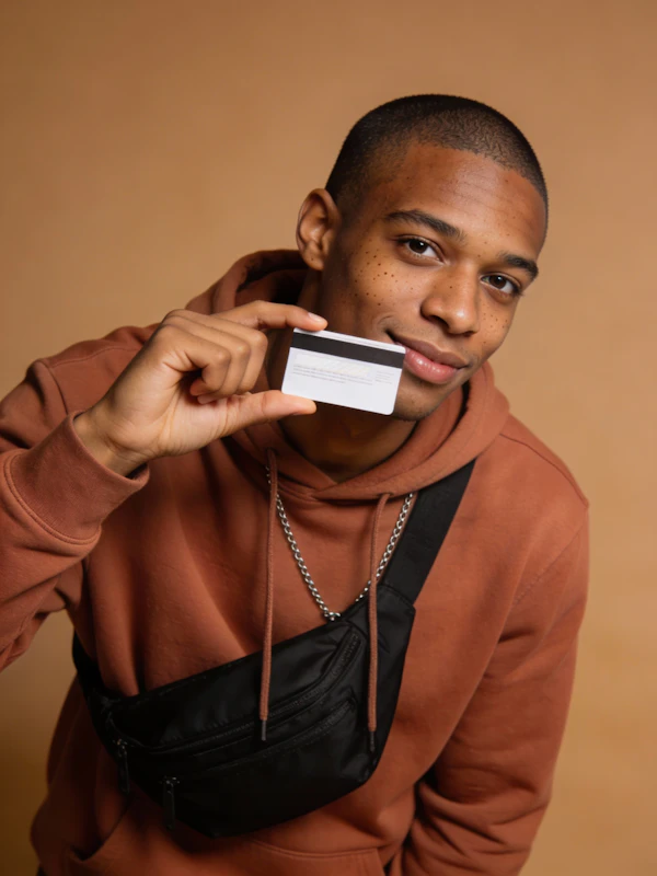 Man Holding a Card
