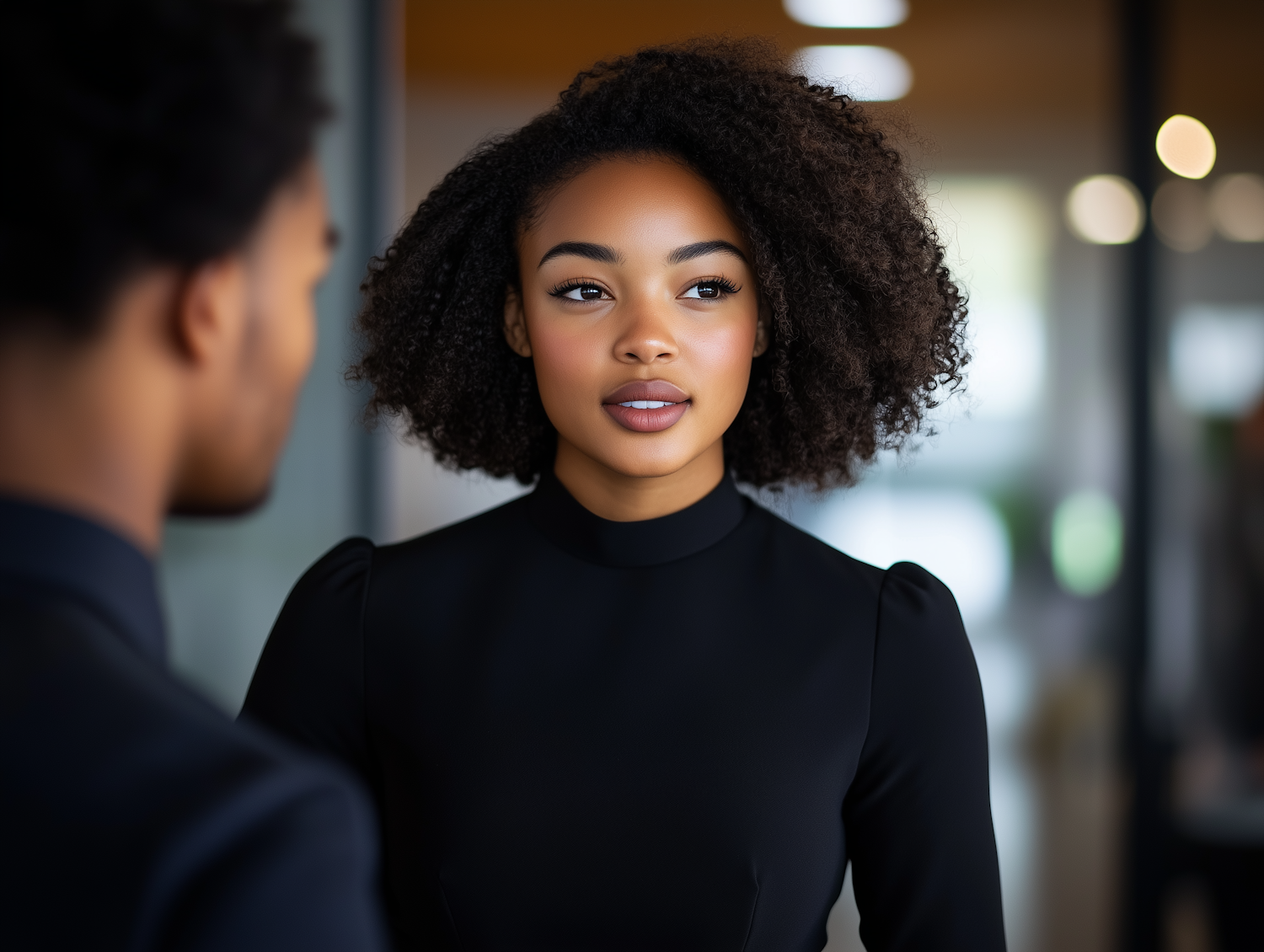 Young Woman in Conversation Indoors