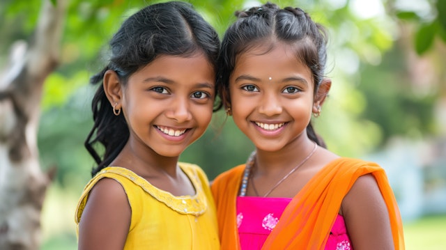 Cheerful Young Girls in Traditional Indian Attire