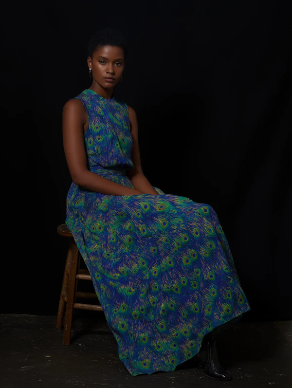 Elegant Portrait in Peacock Feather Printed Dress