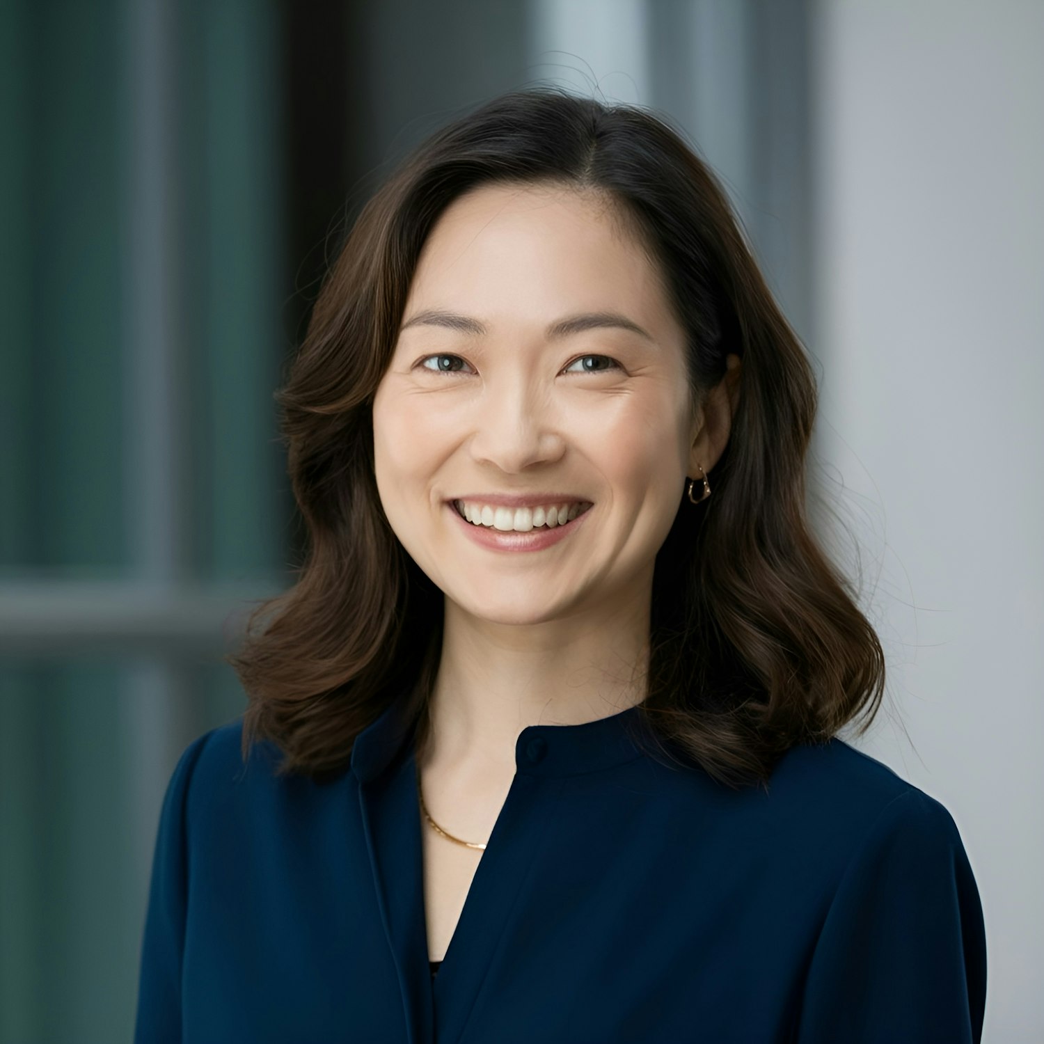 Smiling Asian Woman with Soft Background