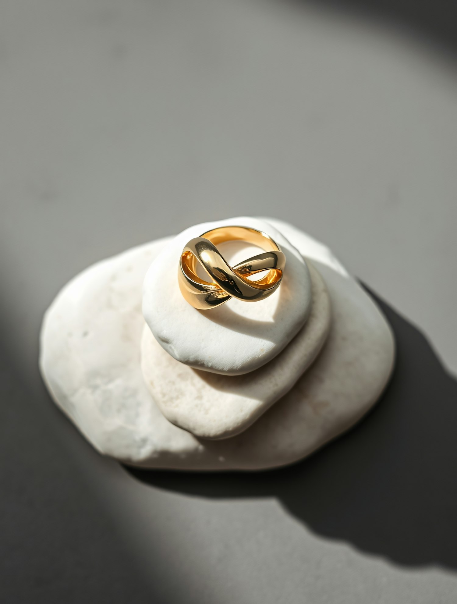 Gold Ring on White Stones