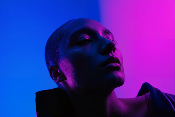 Contemplative Portrait in Blue and Pink
