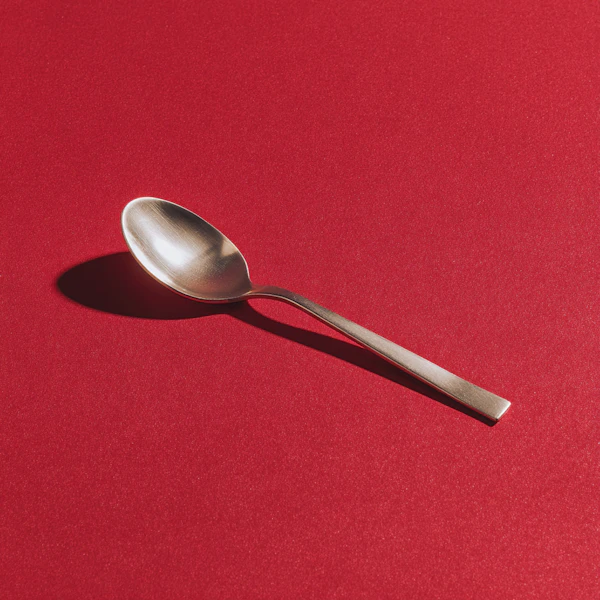 Silver Spoon on Red