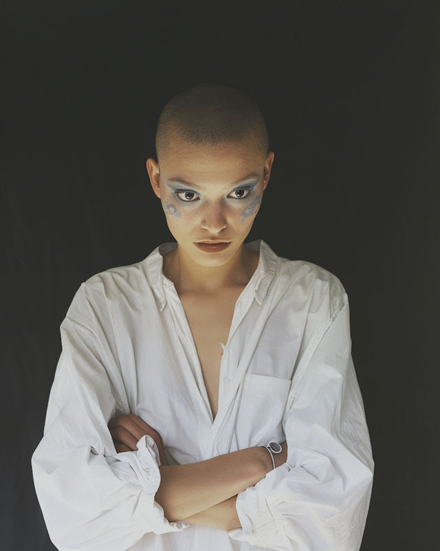 Striking Portrait with Blue Face Paint