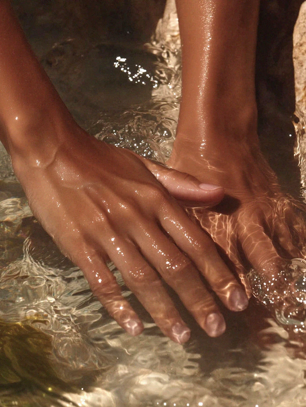 Hands in Rippling Water