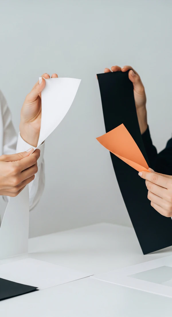 Hands Holding Papers