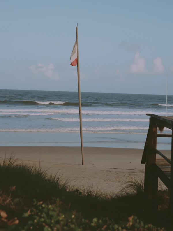 Serene Flagpole on Beach Scene