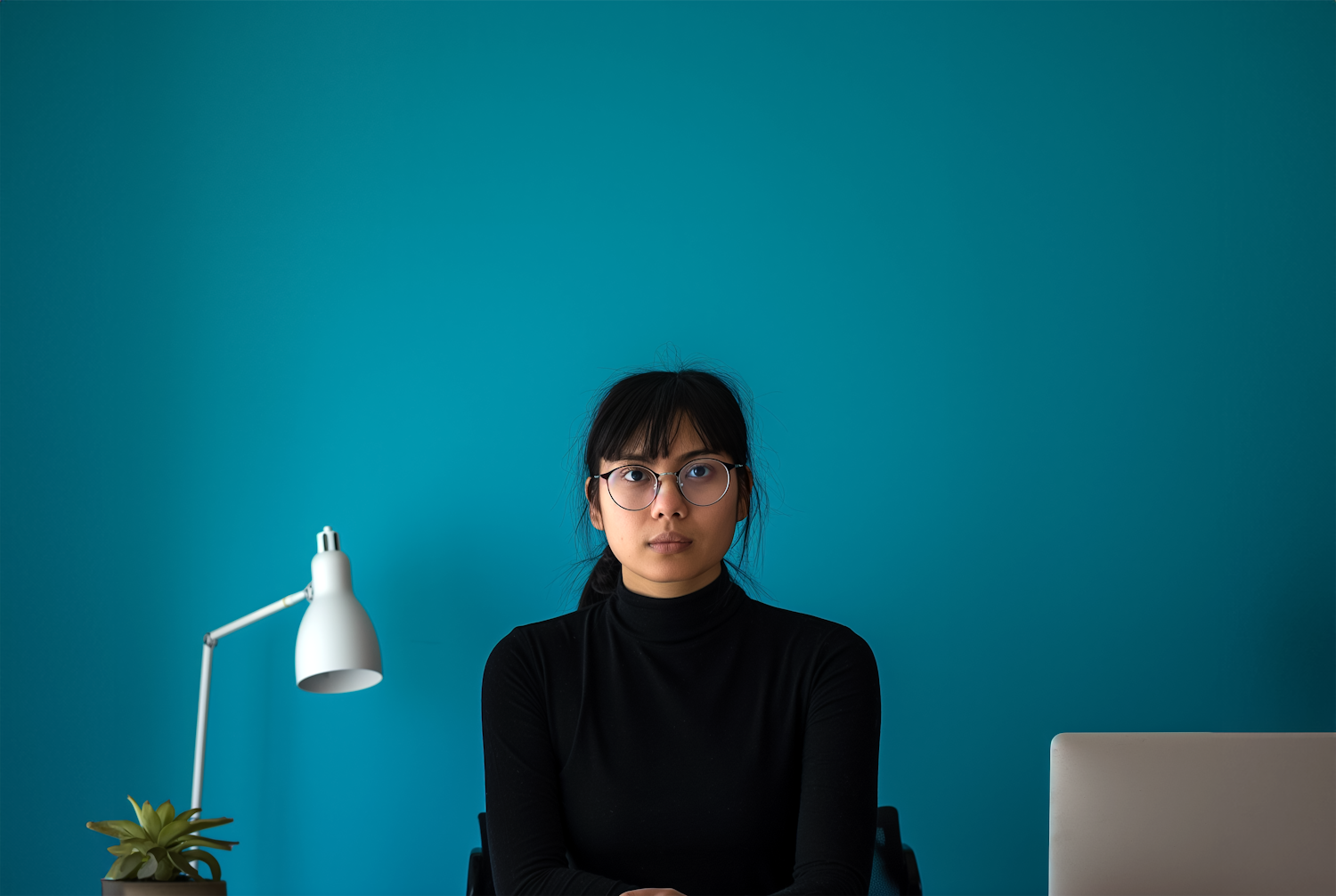 Young Asian Woman with a Neutral Expression