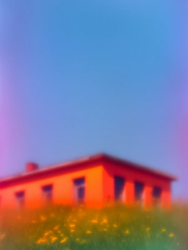 Red Building in Field