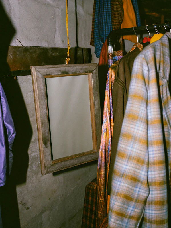 Rustic Mirror and Clothes