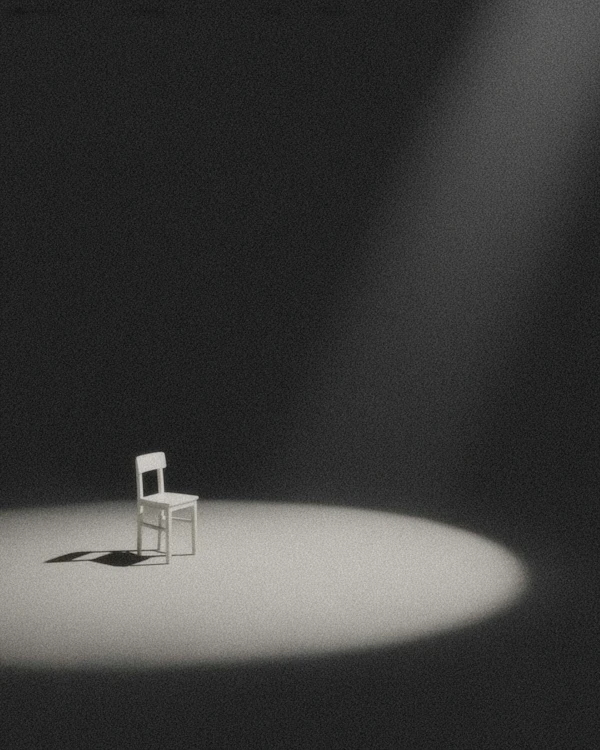 Spotlit Chair in Shadows