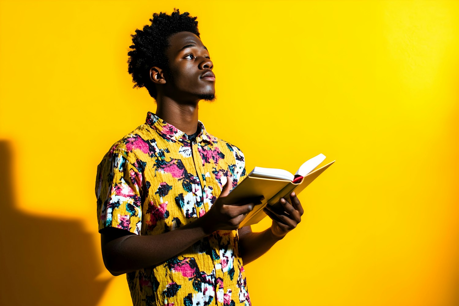 Joyful Young Man Reading