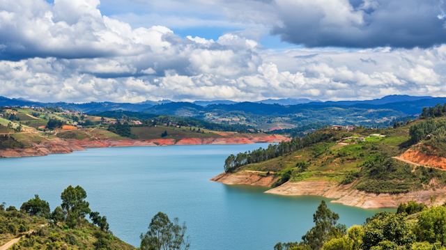 Serene Landscape with Water and Hills