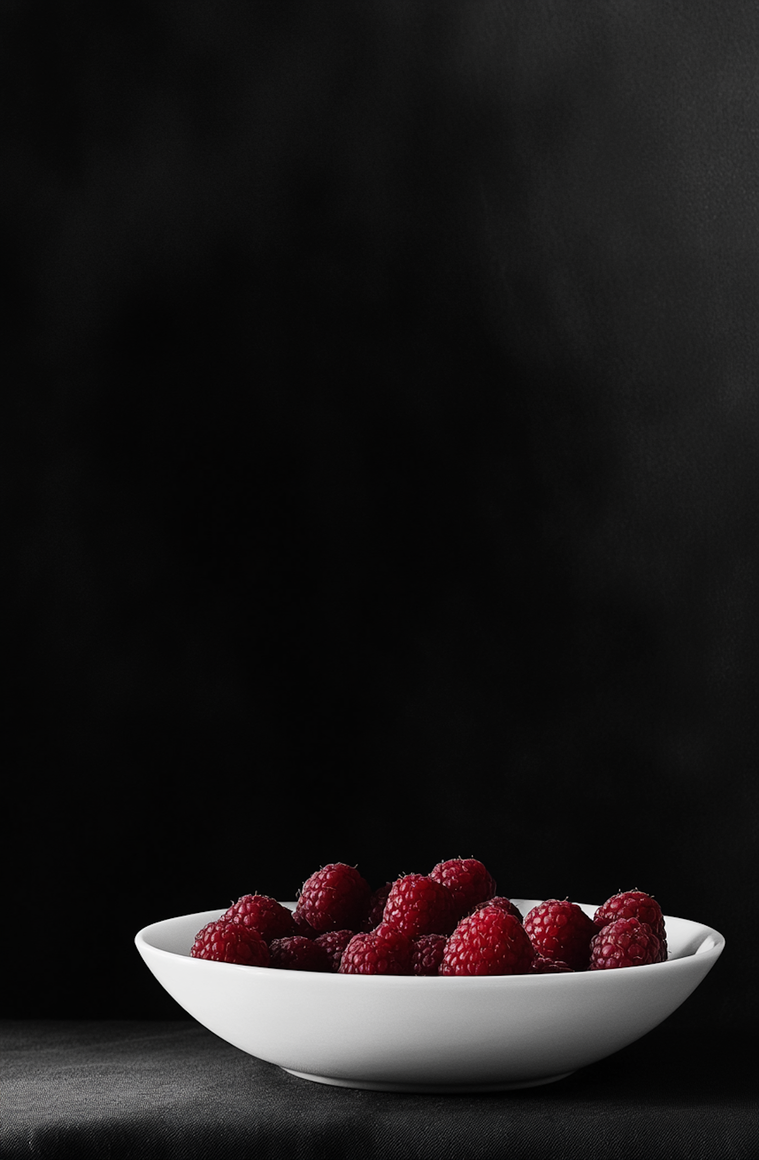 Raspberries in White Bowl