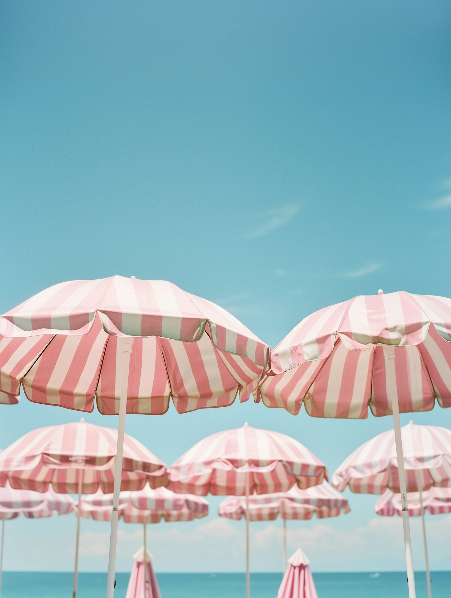 Beach Umbrellas Under Blue Sky