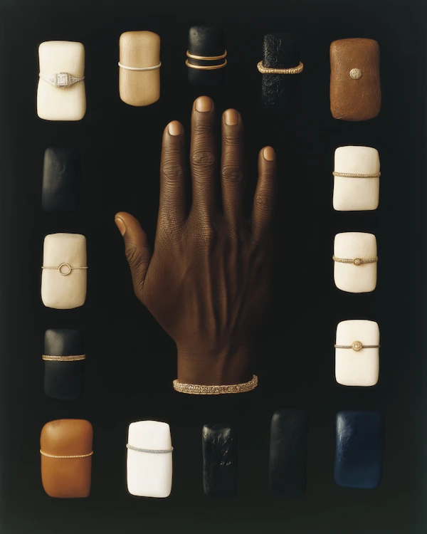 Hand with Jewelry and Textured Objects