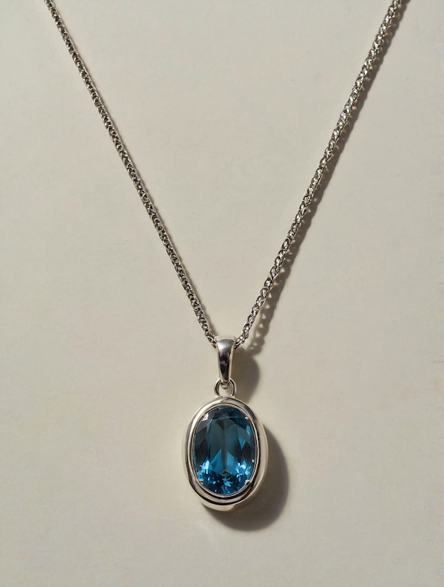 Elegant Silver Necklace with Blue Gemstone