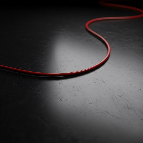 Red Cable on Dark Surface
