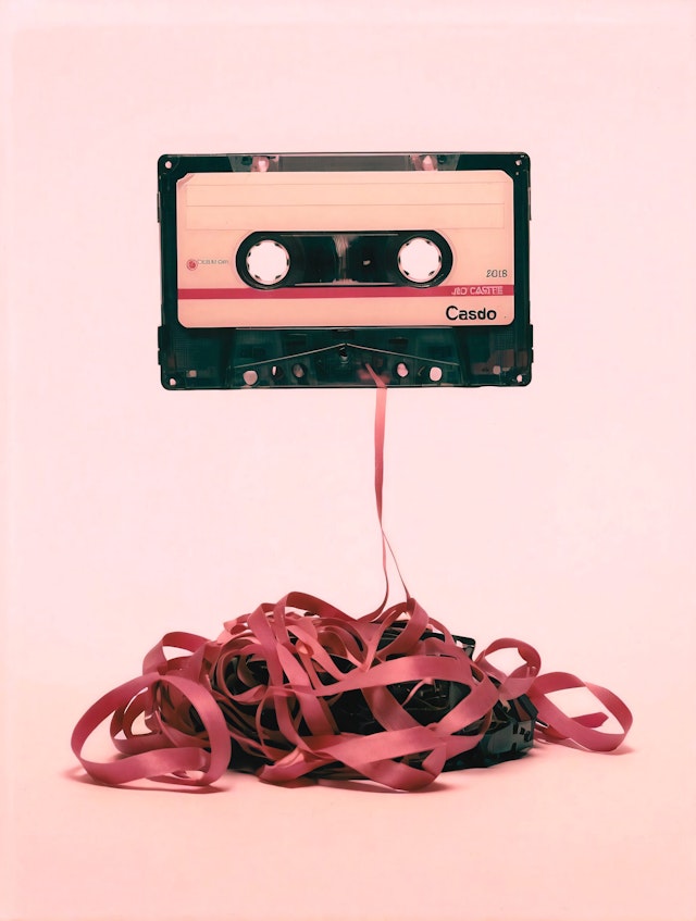 Vintage Cassette Tape on Pink Background