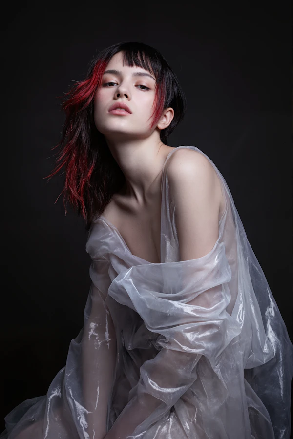Dramatic Portrait with Red and Black Hair