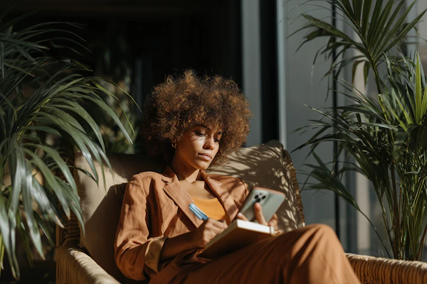 Woman Writing in Garden